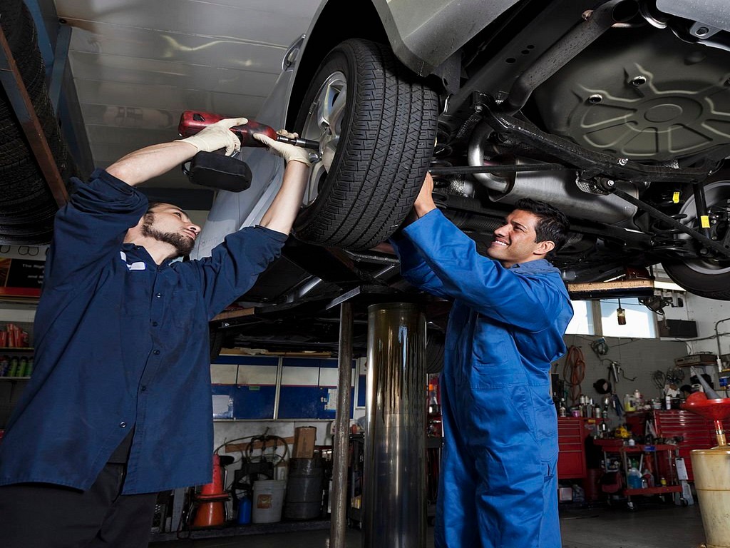 wheel alignment service in auto repair shop