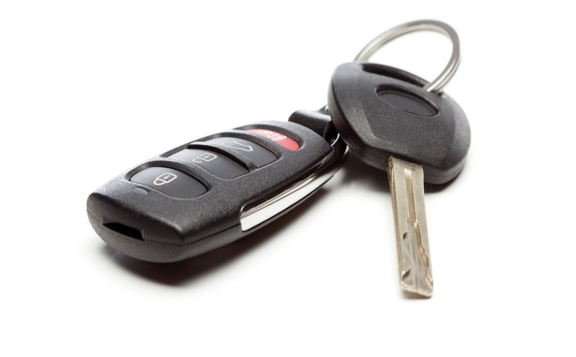 Modern Car Key and Remote Isolated on a White Background.